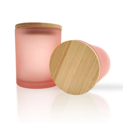 pink glass jar with wooden lid on white background